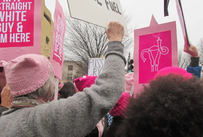 people at a womens right protest