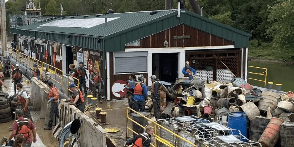 People walking around a dock during The Ohio River Clean Up