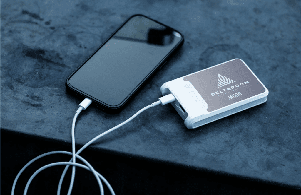 phone plugged into a custom and personalized power bank
