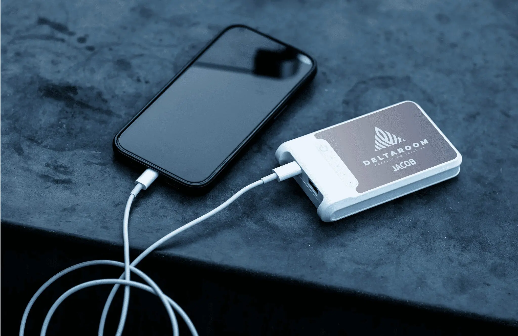 phone plugged into a custom and personalized power bank