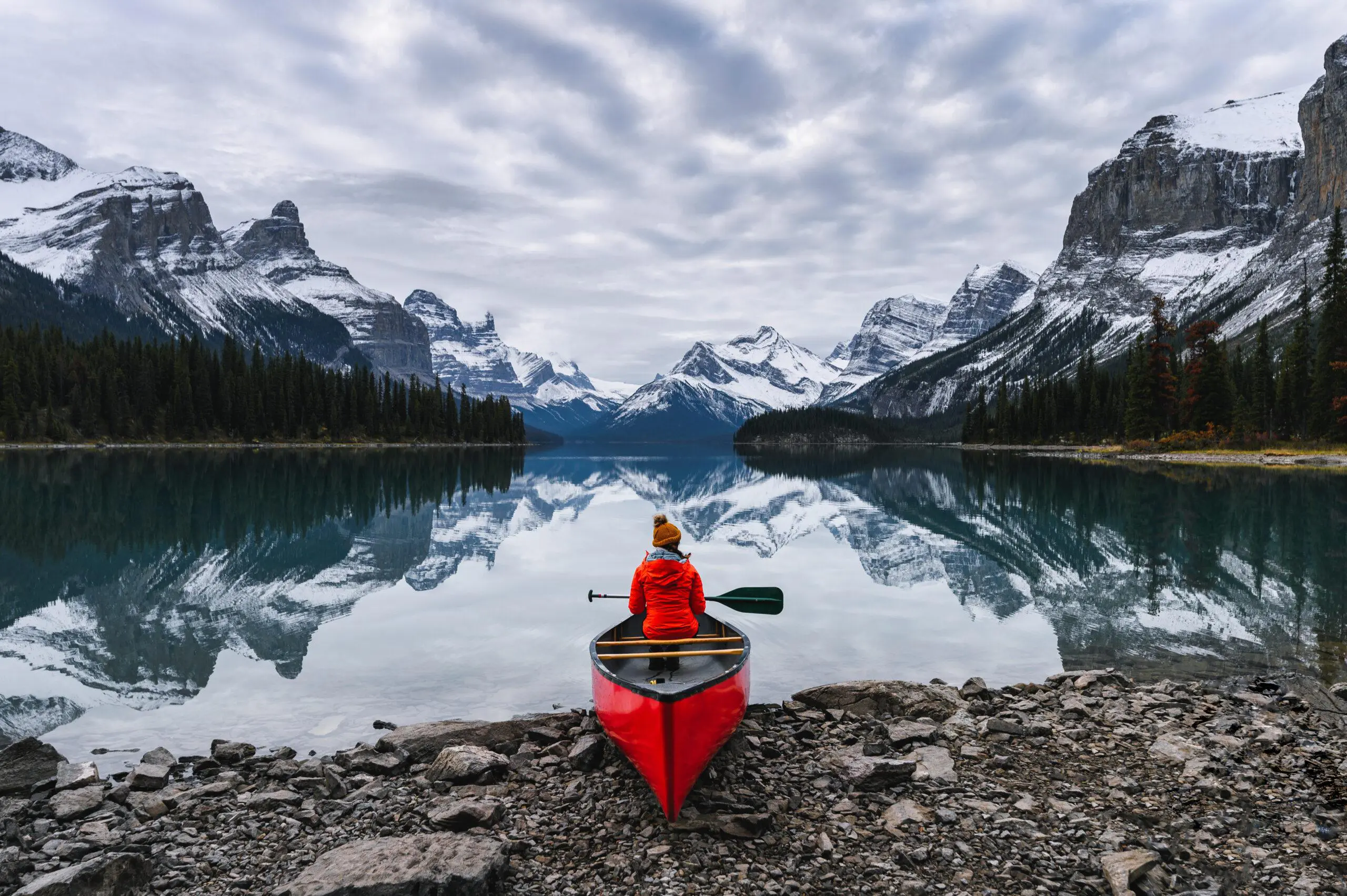 cover of made in canada lookbook - person in canoe surrounded by Canadian landscape