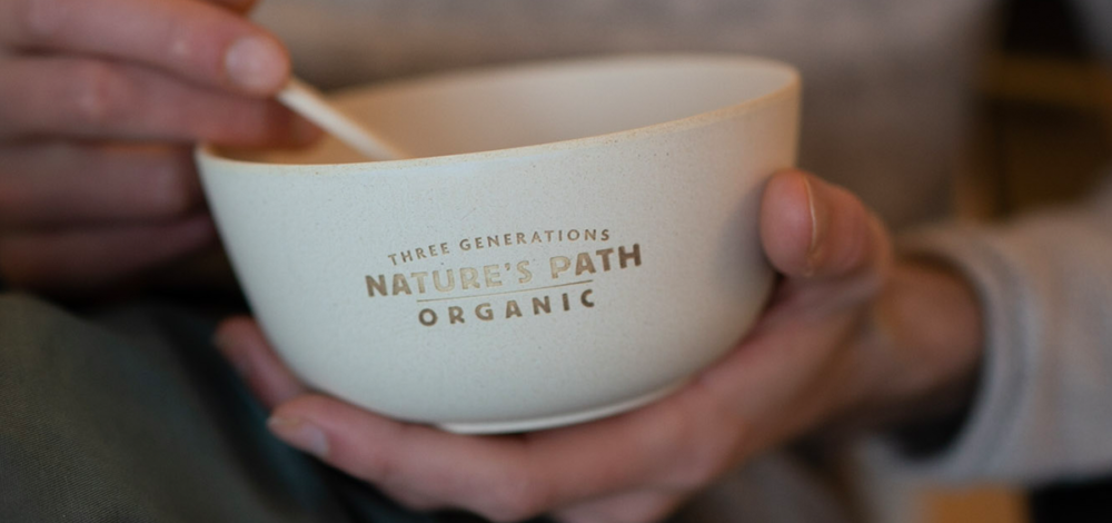 Wheat straw reusable bowl branded with Natures Path logo that reads: Three Generations Nature's Path Organic.