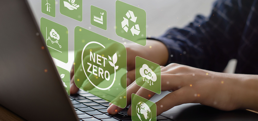 net zero banner with icons and a laptop