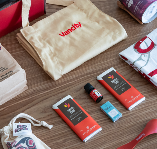 vancity branded items for an employee kit laying on a table