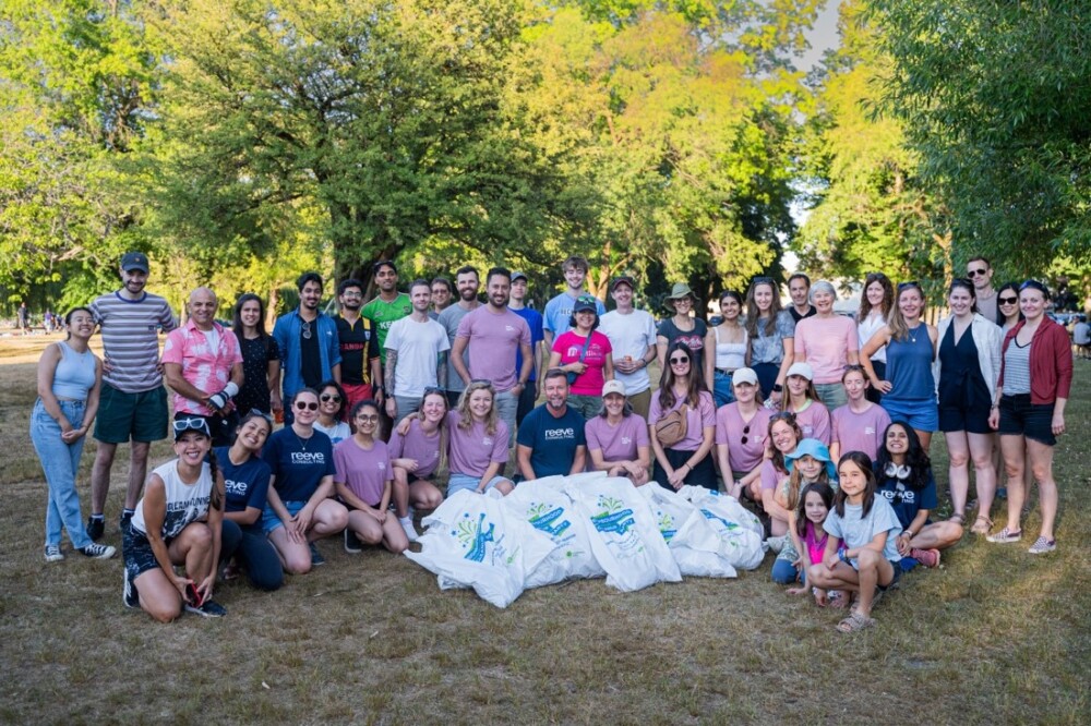Group photo of participants of the beach clean up with approximately 43 people showing