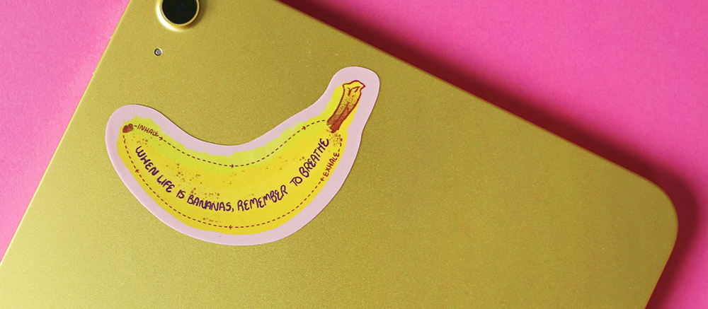 sensory sticker shaped like a banana on a laptop