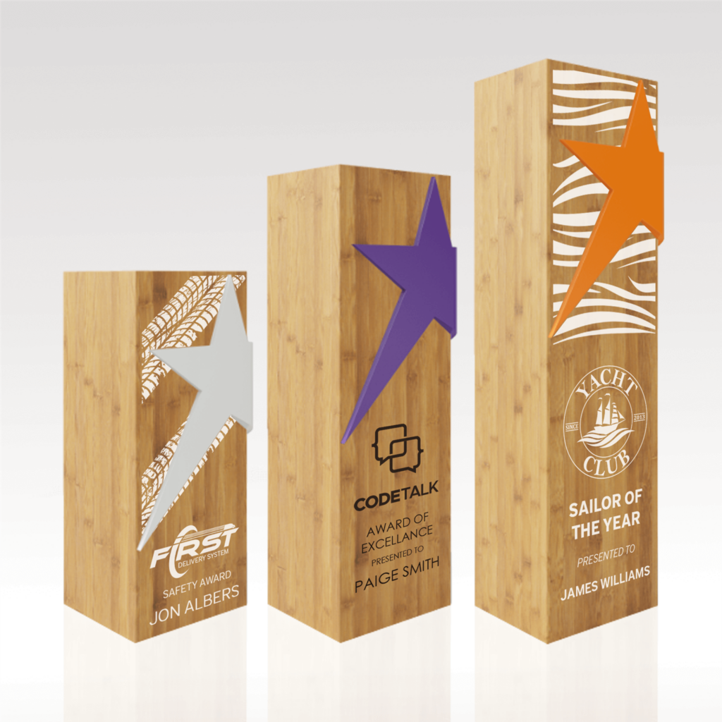 three bamboo awards in different sizes