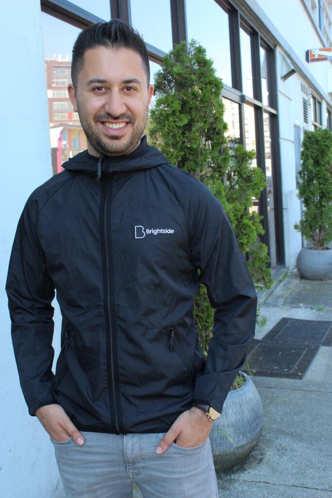 Brightside water proof patch on jacket worn by sina