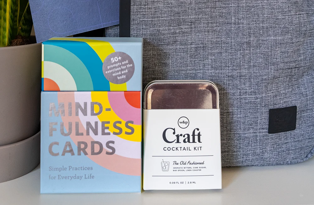 gift kit that includes a backpack mindfullness cards and a mocktail kit
